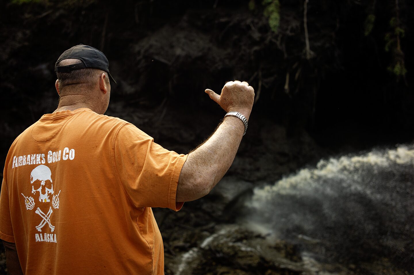 "John Reeves, the owner of Fairbanks Gold Company directing the water from the giant and discovery in the permafrost. Working at the Boneyard Alaska, Master Boner John Reeves is directing the water from the giant. John Reeves, Master Boner and the owner of Fairbanks Gold Company working the dig site of massive proportion. The larges private dig site and discovery of animal bones from the Last Ice Age are on this very property in Fairbanks Alaska USA. Historic discovery of animals living during the Last Ice Age has been discovered here. "