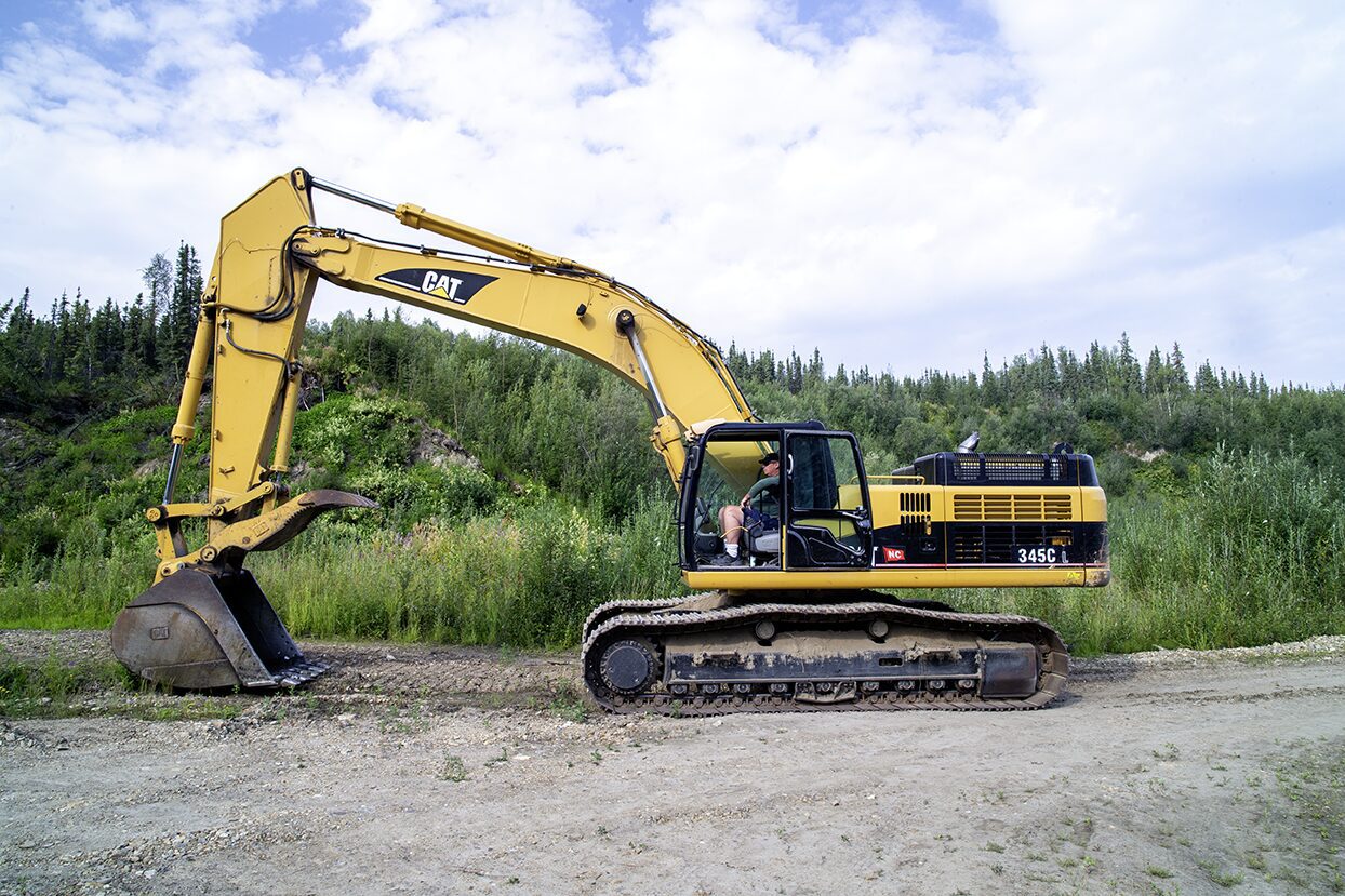 CAT 345C L, Caterpillar,Hydraulic, excavator at the Boneyard Alaska, dig site in the summer of 2015, Photo outside of Johne Reeves operating heawy excevator