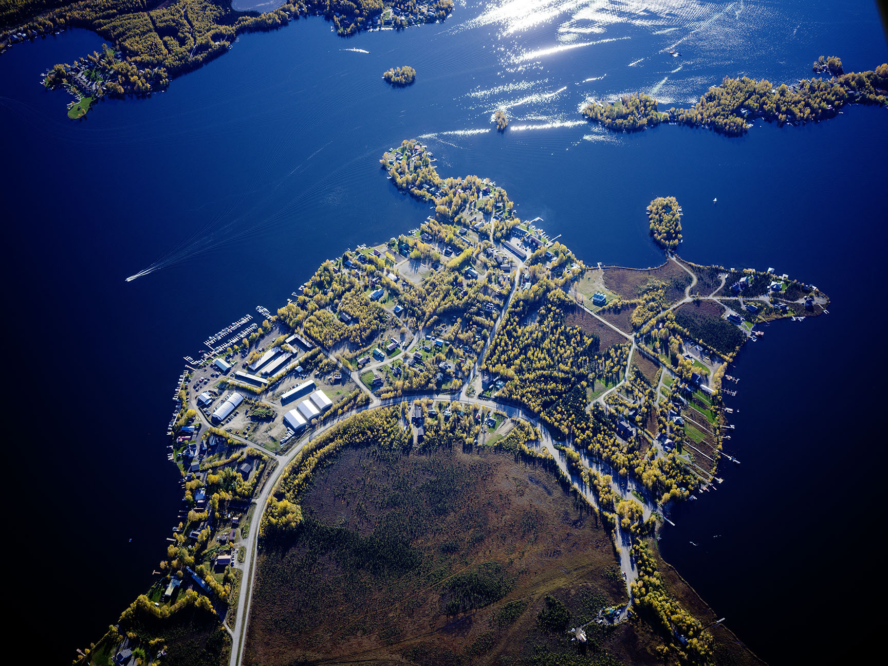 Big Lake community in Alaska on the lake.  An aerial photo of the community at the lake..
