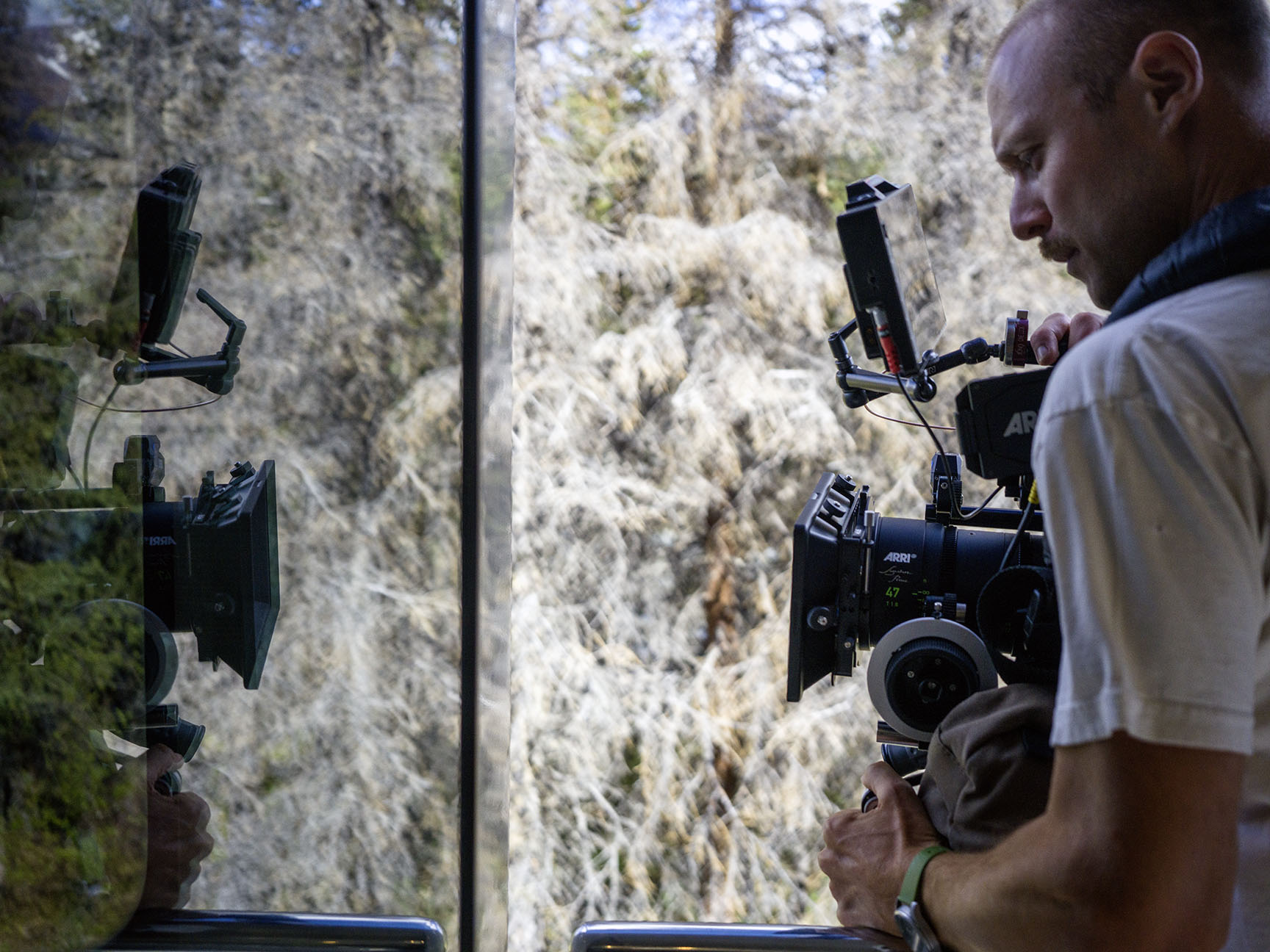 Director of photography framing up the next shot on the Alaska Rail Road train.
